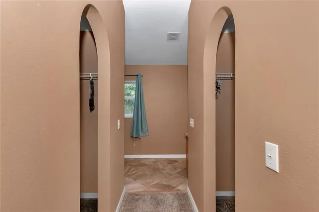 a bathroom with a sink a vanity and a mirror