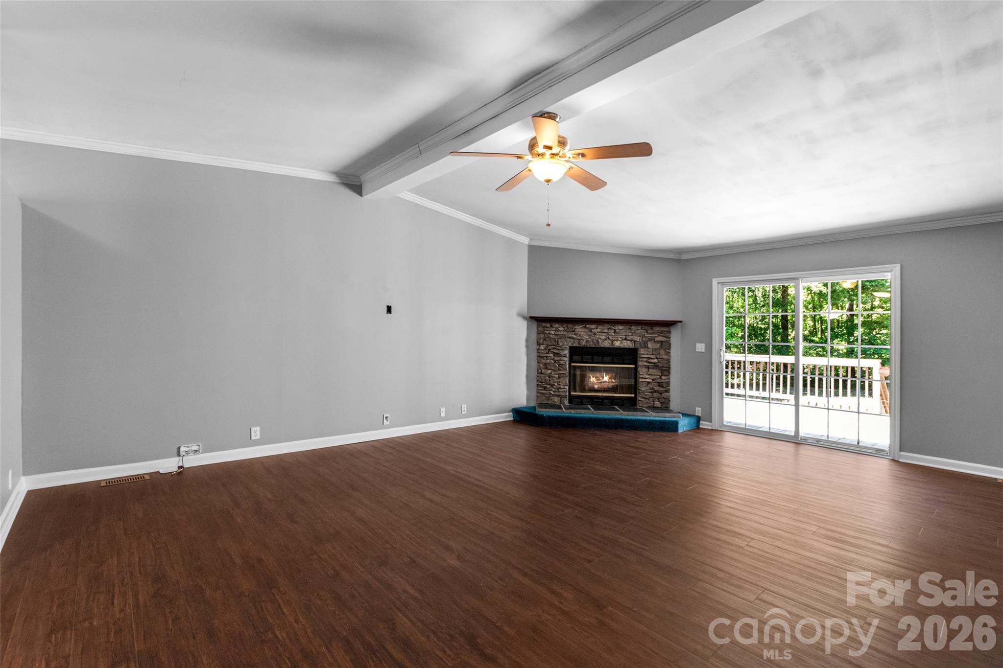 434 Rutledge Drive Catawba, SC 29704 - Photo 6 of 39 a view of an empty room with a window and wooden floor
