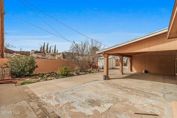 a kitchen with a refrigerator sink and stove