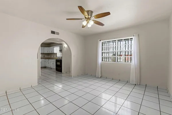 a view of an empty room and window