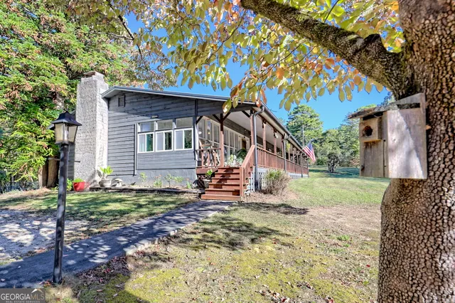 front view of a house with a yard