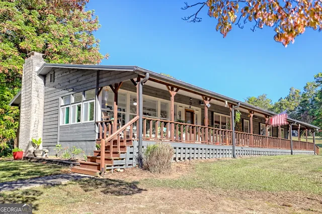 a view of a balcony with chairs
