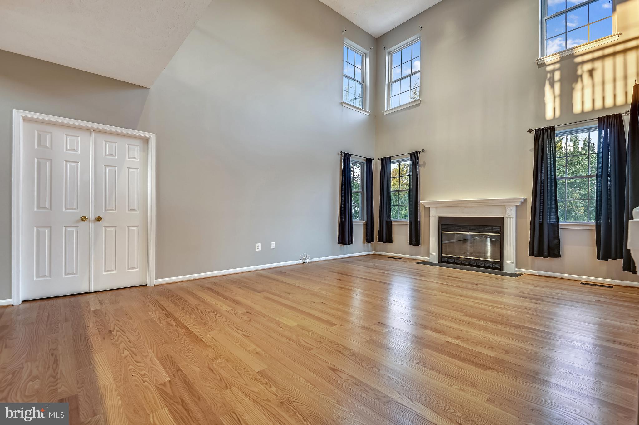 12 Monocacy Circle Taneytown, MD 21787 - Photo 12 of 52 Family room with 2-story view of the pond and park