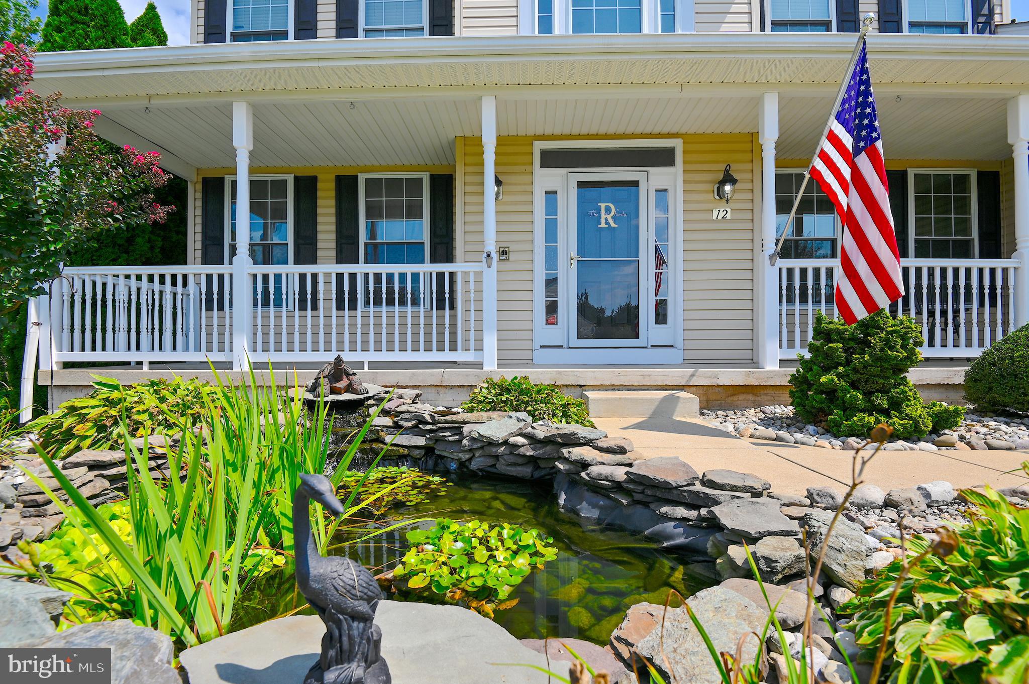 12 Monocacy Circle Taneytown, MD 21787 - Photo 5 of 52 Beautiful landscaping & koi pond