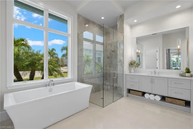a bathroom with sink shower and bathtub