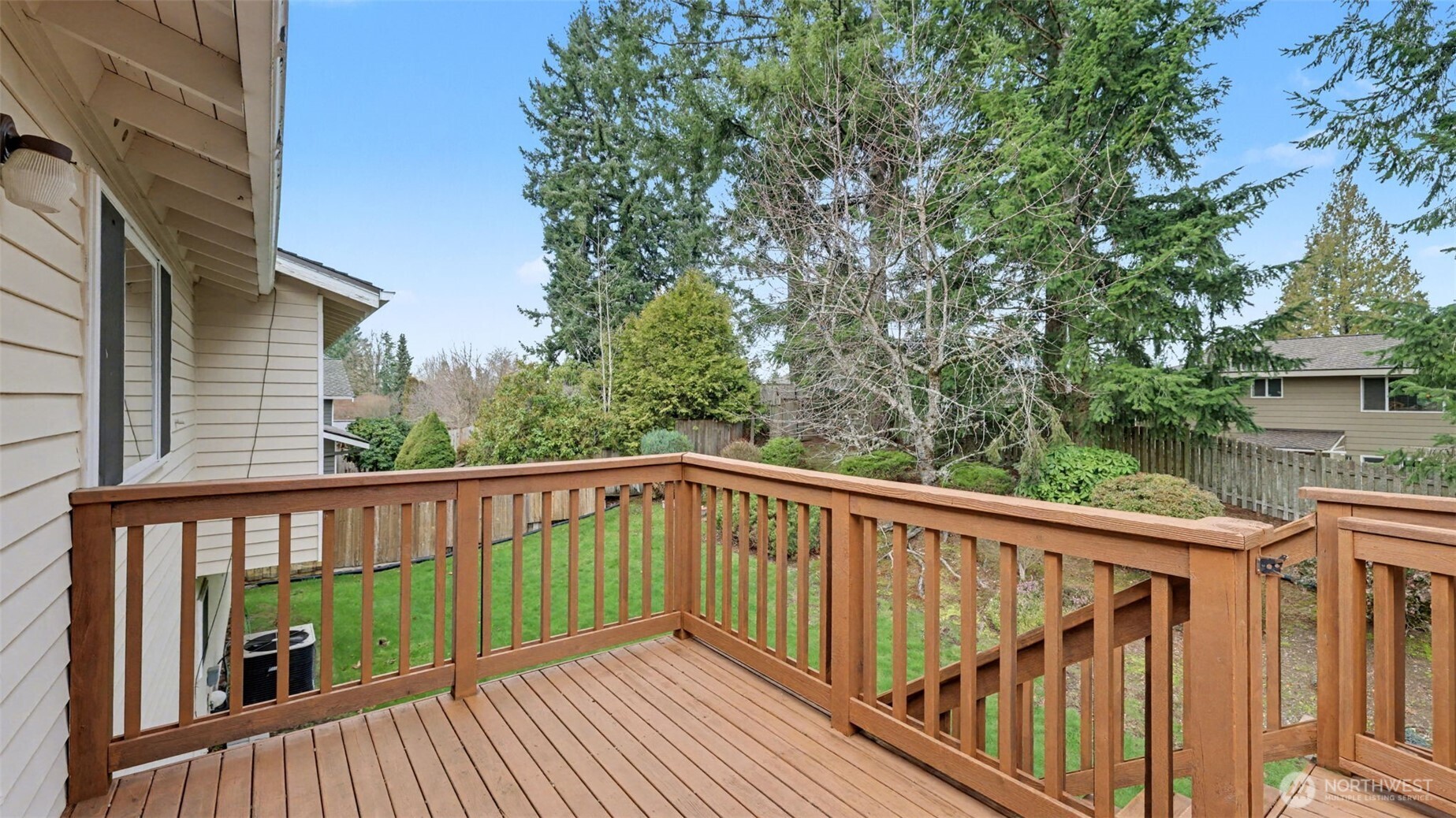 16012 Southeast 172nd Place Renton, WA 98058 - Photo 14 of 31 a view of balcony with wooden floor and fence