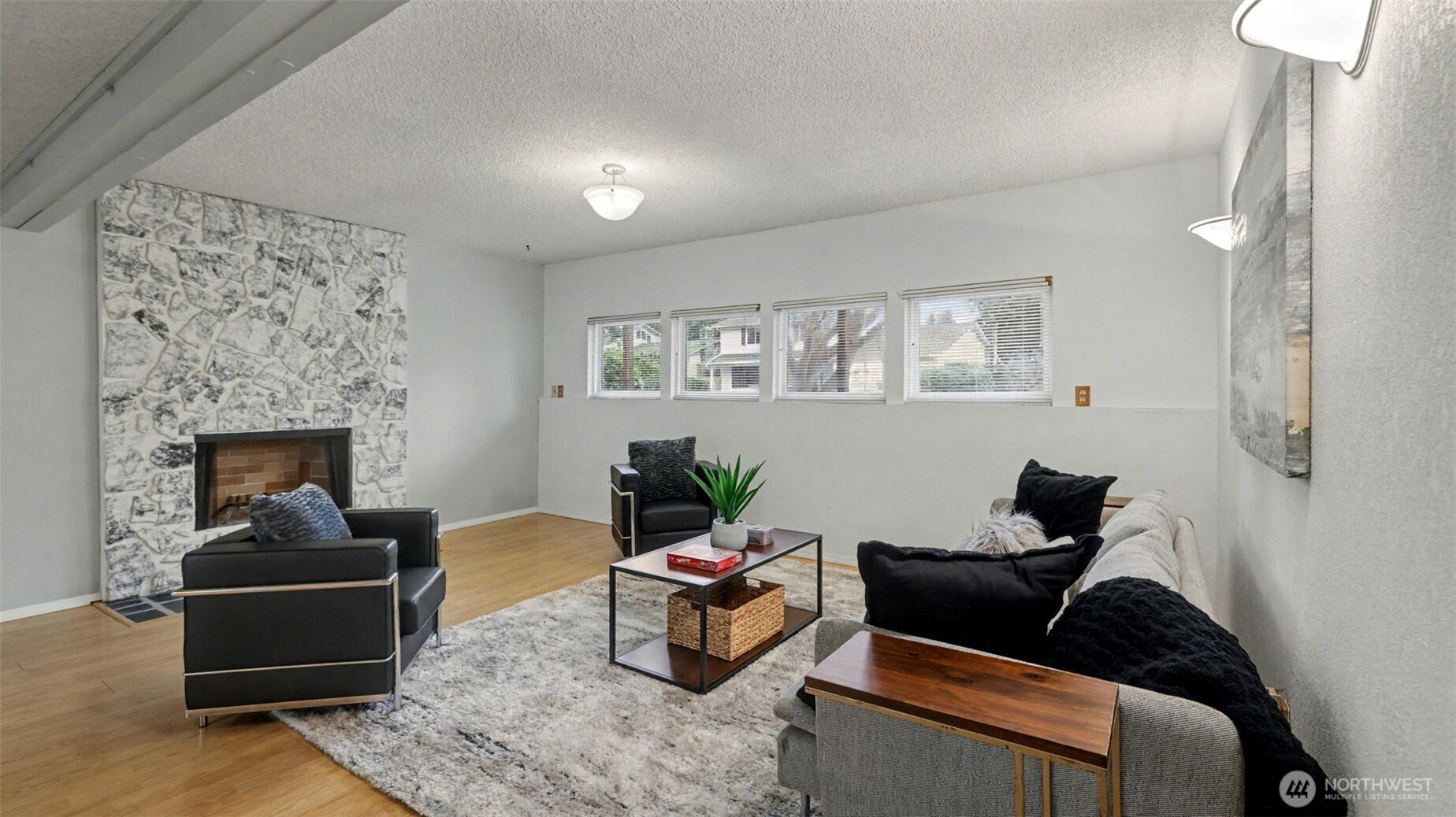 16012 Southeast 172nd Place Renton, WA 98058 - Photo 21 of 31 a living room with furniture and a fireplace