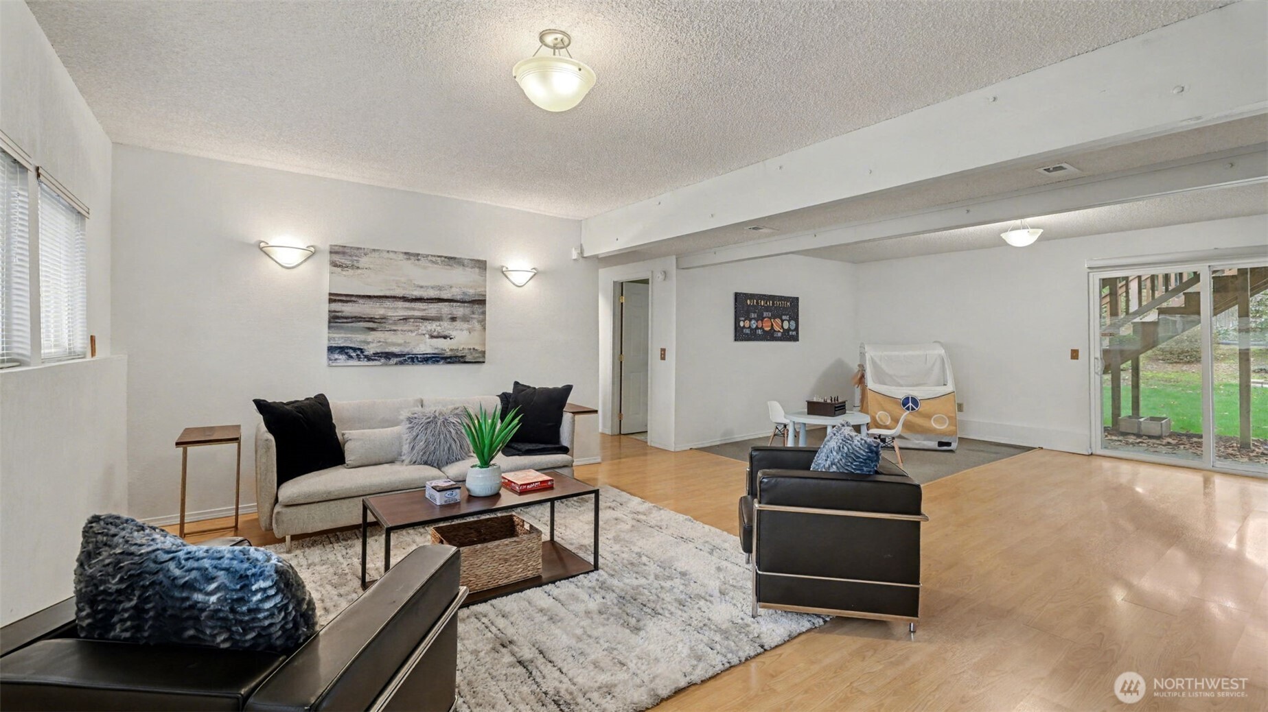 16012 Southeast 172nd Place Renton, WA 98058 - Photo 24 of 31 a living room with furniture and a table