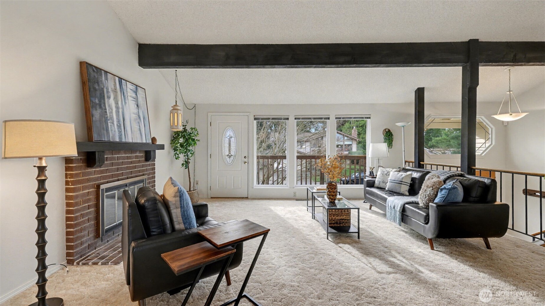 16012 Southeast 172nd Place Renton, WA 98058 - Photo 6 of 31 a living room with furniture and a large window