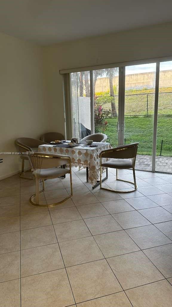 12415 Southwest 42nd Street Miramar, FL 33027 - Photo 12 of 50 a building outdoor space with patio furniture