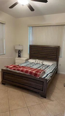 a room with furniture and a mirror