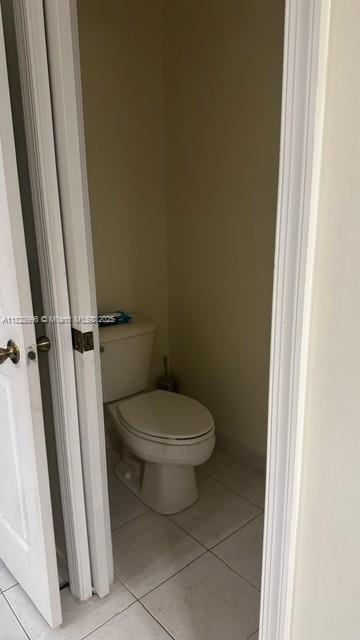 12415 Southwest 42nd Street Miramar, FL 33027 - Photo 27 of 50 a white toilet sitting next to a shower