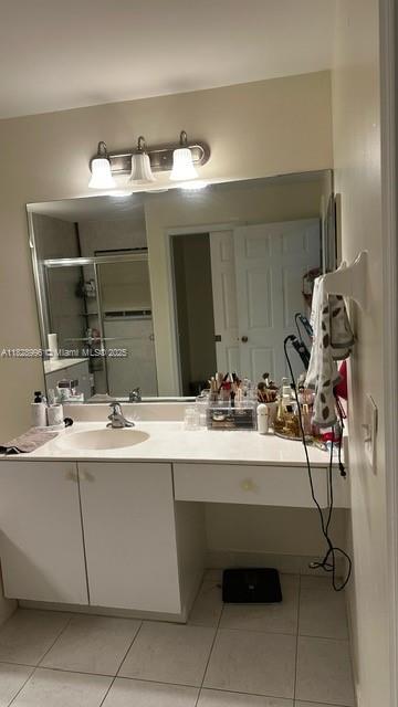 12415 Southwest 42nd Street Miramar, FL 33027 - Photo 30 of 50 a bathroom with a sink and a mirror
