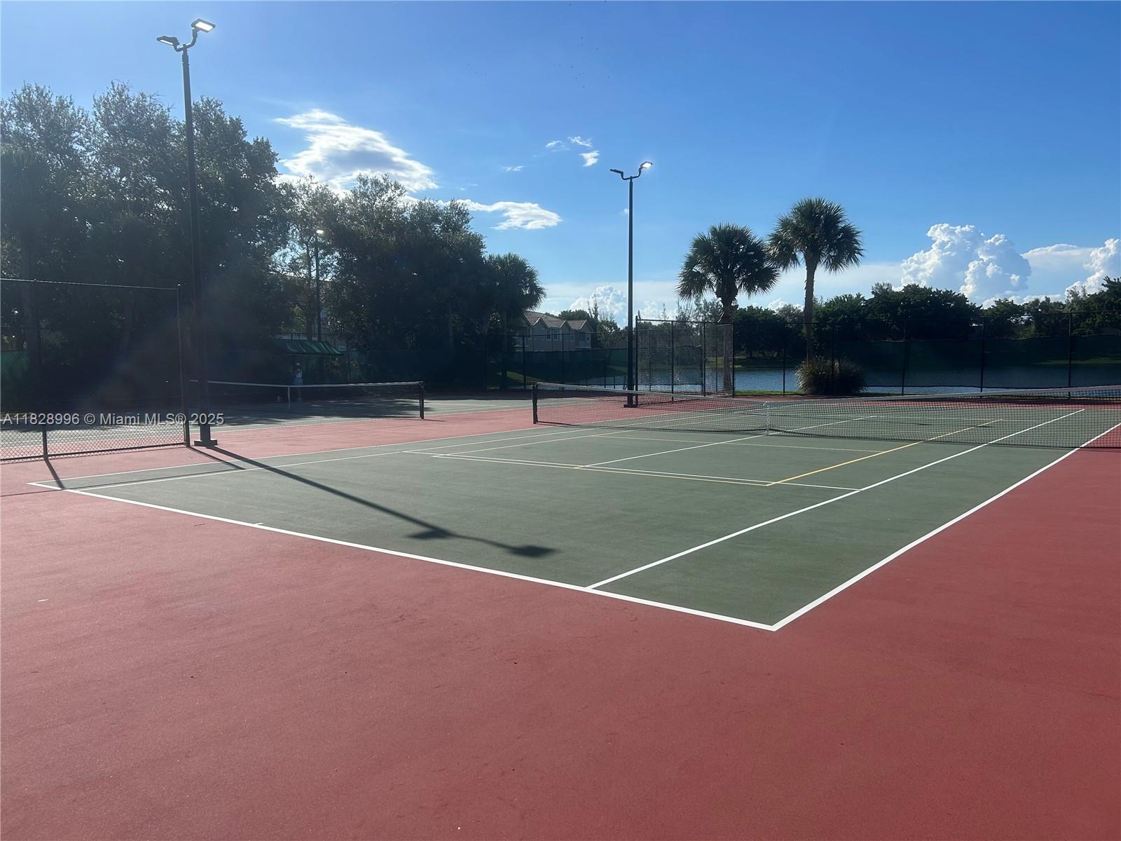 12415 Southwest 42nd Street Miramar, FL 33027 - Photo 48 of 50 a view of a tennis court