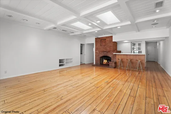 a view of livingroom with furniture and fireplace
