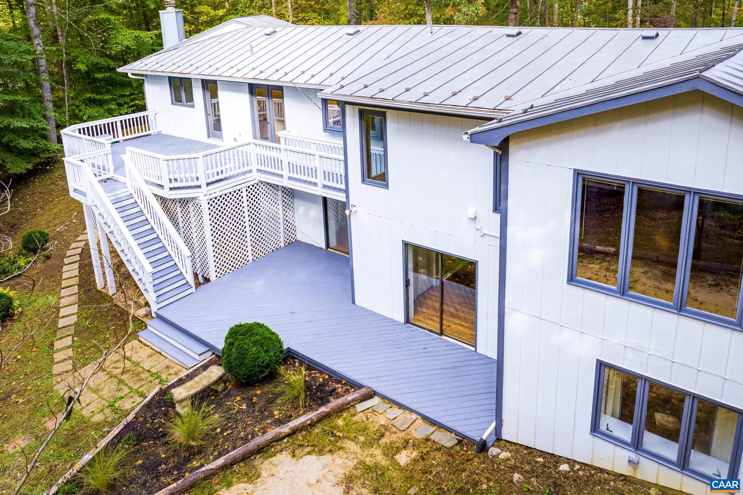 1065 Tilman Road Charlottesville, VA 22901 - Photo 17 of 70 a view of a house with a patio