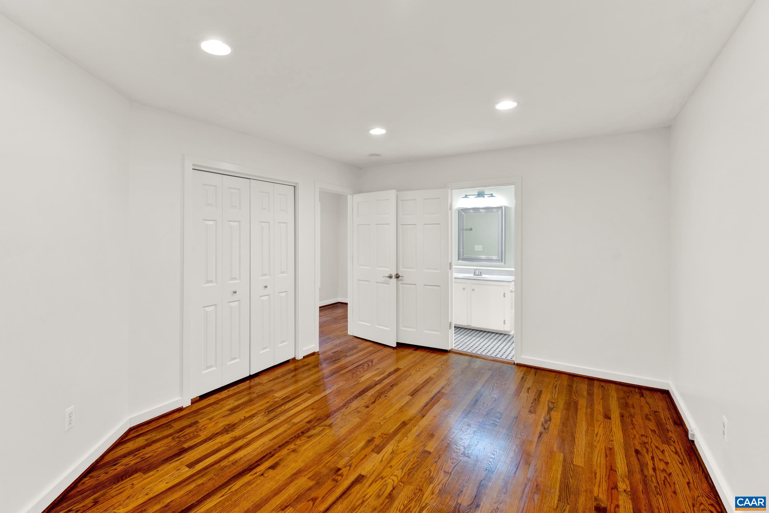 1065 Tilman Road Charlottesville, VA 22901 - Photo 50 of 70 a view of a livingroom with wooden floor