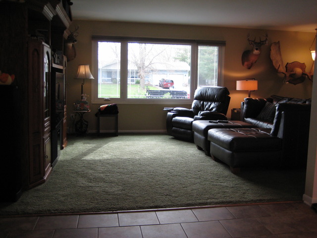 137 South Anderson Road New Lenox, IL 60451 - Photo 9 of 24 a living room with furniture and a large window