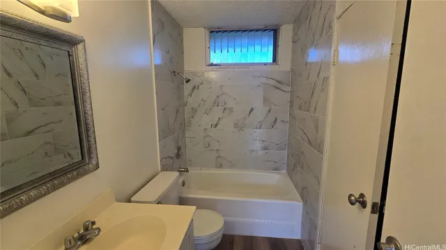 a bathroom with a sink and a bathtub