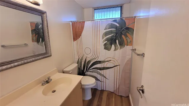 a bathroom with a sink and mirror