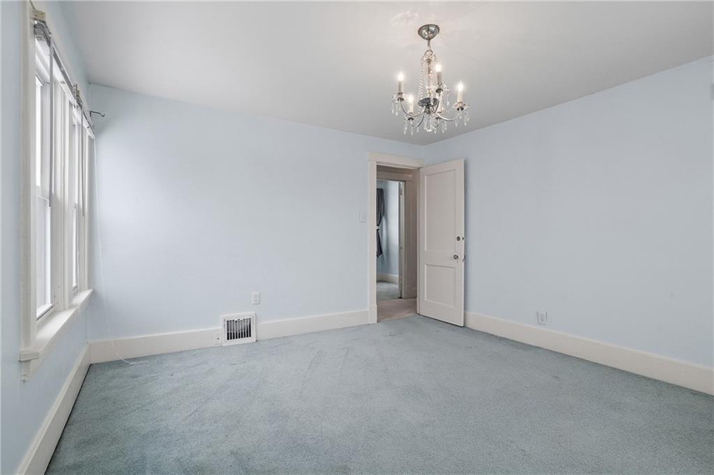 230 West Fulton Street Butler, PA 16001 - Photo 16 of 40 wooden floor in an empty room with a window