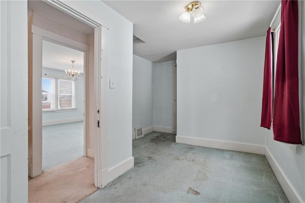 230 West Fulton Street Butler, PA 16001 - Photo 17 of 40 an empty room with closet and a window