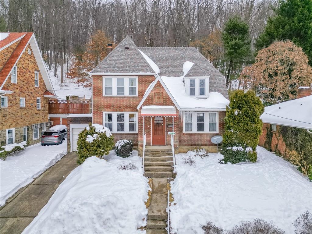 230 West Fulton Street Butler, PA 16001 - Photo 35 of 40 a front view of a house with garden