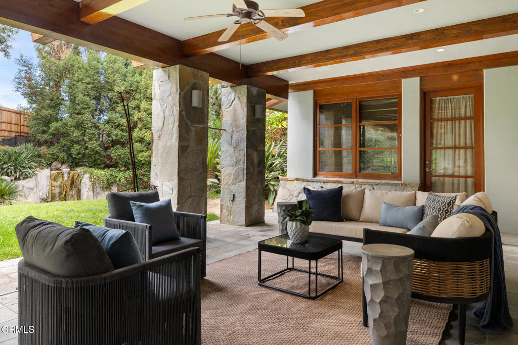 921 Chapea Road Pasadena, CA 91107 - Photo 12 of 22 a living room with furniture and floor to ceiling windows