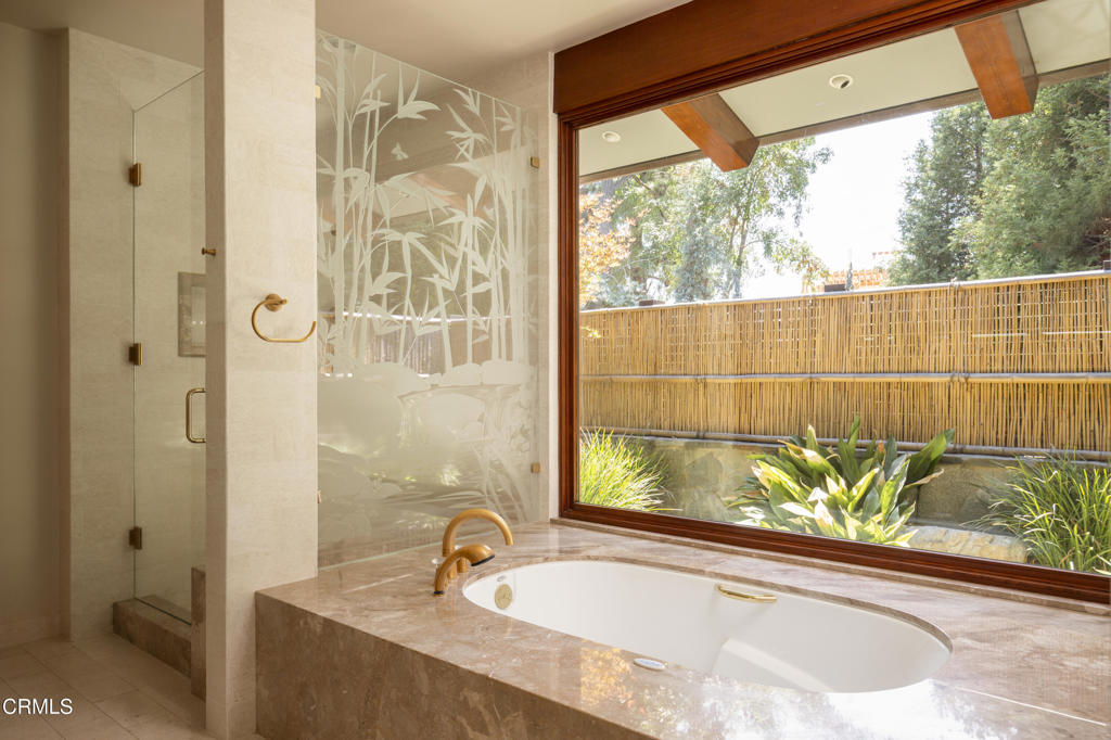 921 Chapea Road Pasadena, CA 91107 - Photo 19 of 22 a bathroom with a tub and sink