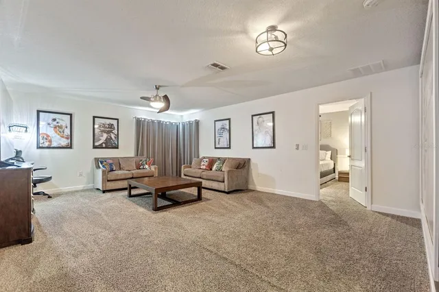 a living room with furniture and window