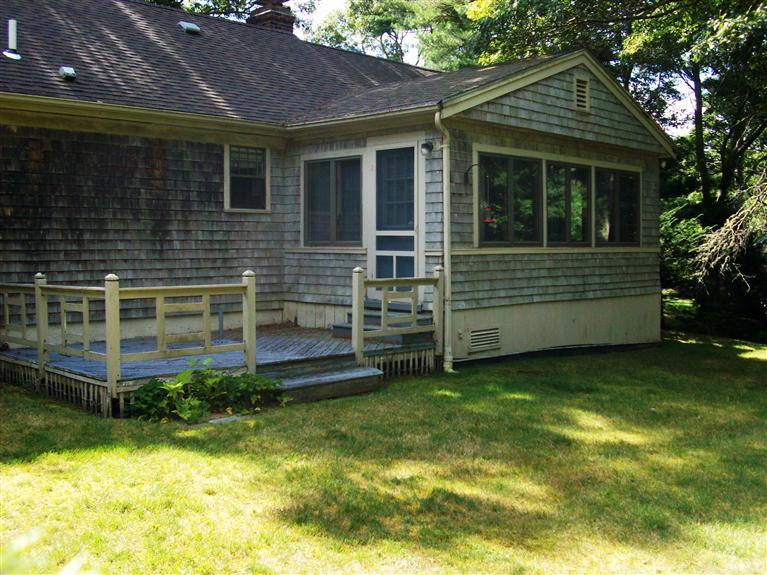 83 Sandy Valley Road Marstons Mills, MA 02648 - Photo 3 of 3 a front view of a house with a yard