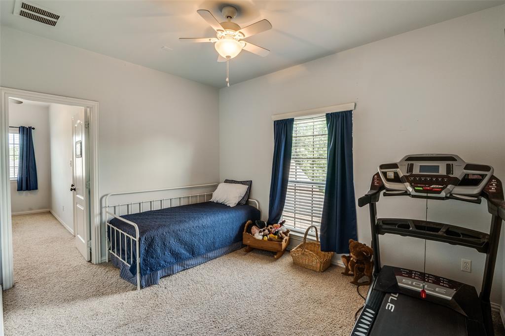 336 Maggie Street Canton, TX 75103 - Photo 20 of 30 a bedroom with bed and a window