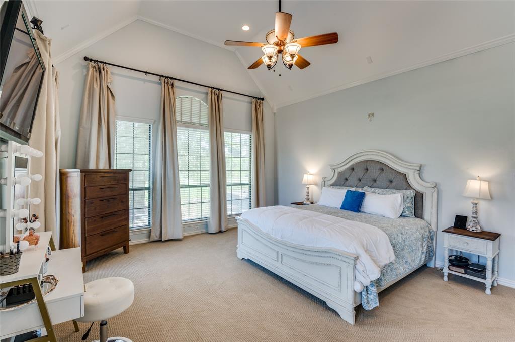 336 Maggie Street Canton, TX 75103 - Photo 23 of 30 a bedroom with a bed chandelier and a window