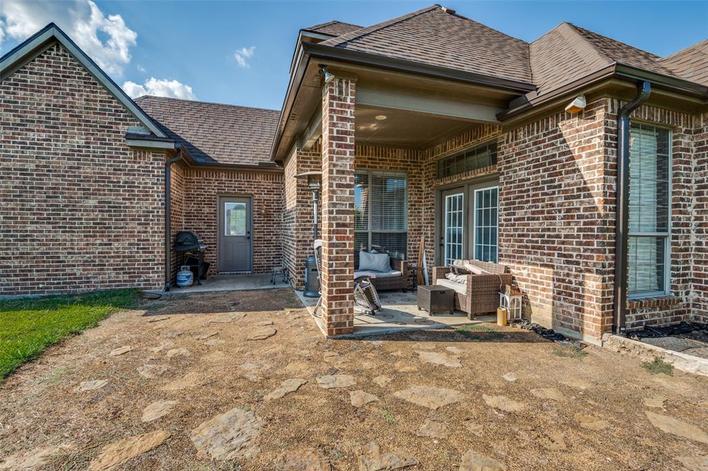 336 Maggie Street Canton, TX 75103 - Photo 27 of 30 a front view of a house with garden