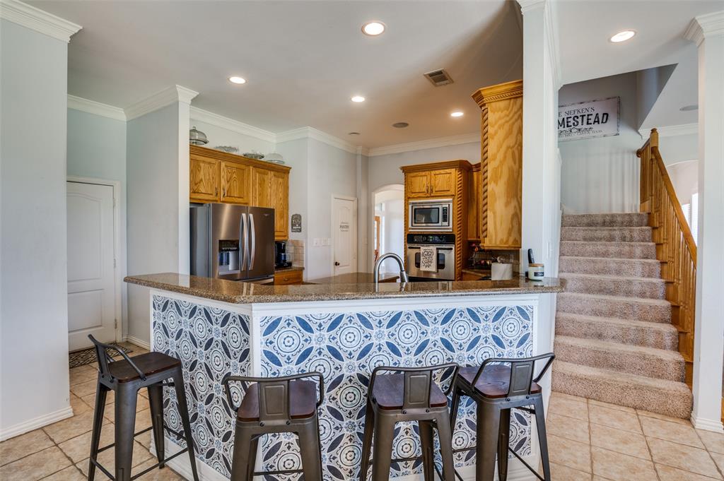 336 Maggie Street Canton, TX 75103 - Photo 7 of 30 a view of kitchen with table and chairs