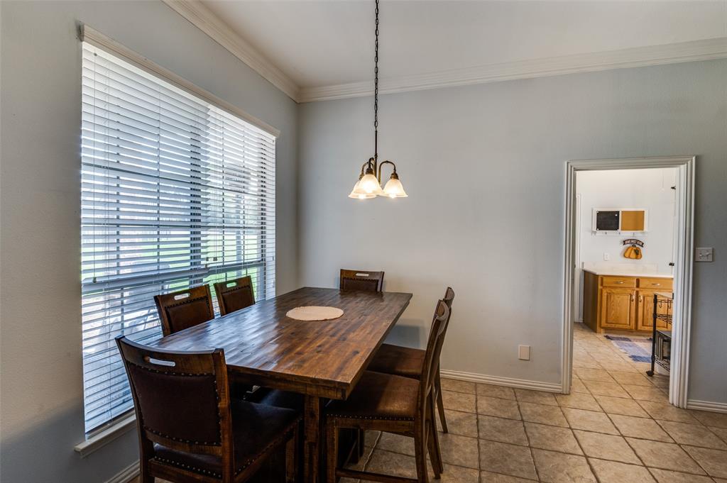 336 Maggie Street Canton, TX 75103 - Photo 8 of 30 a view of a dining room with furniture and window