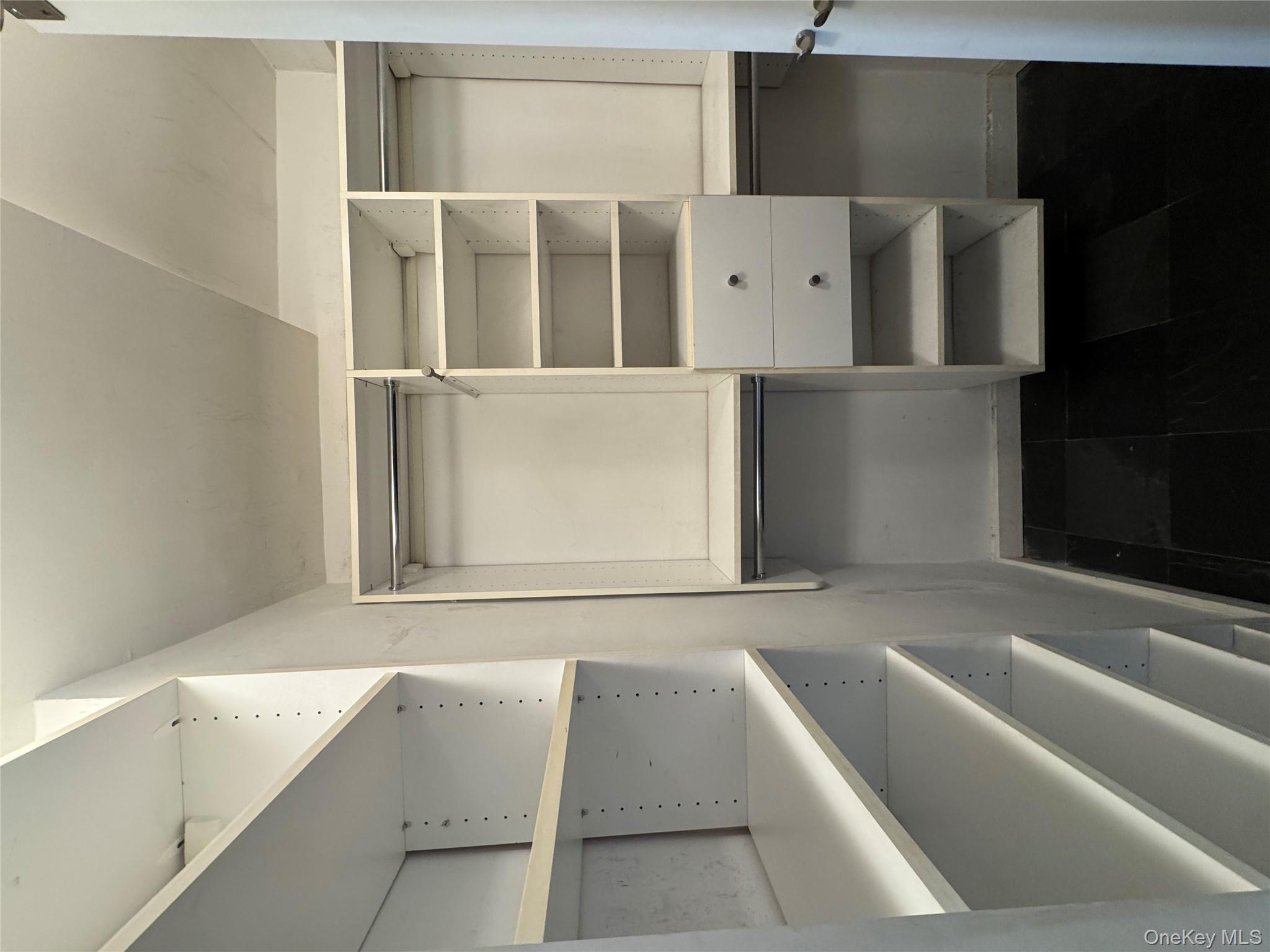 333 East 53rd Street, Unit 5C Manhattan, NY 10022 - Photo 24 of 27 a room with storage and utility