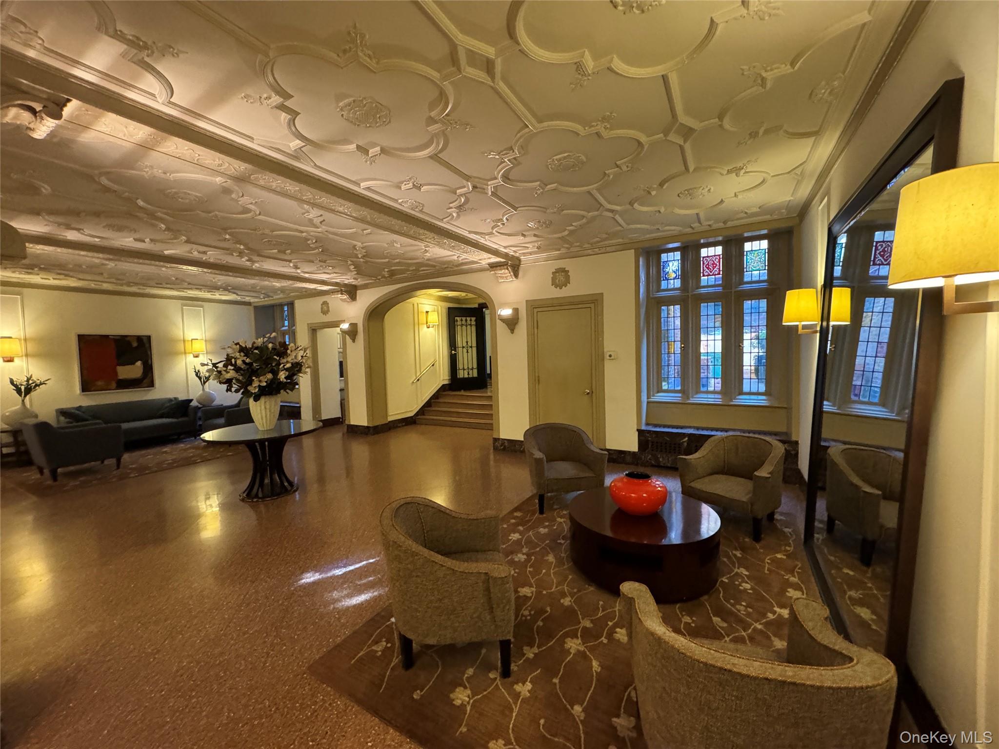 333 East 53rd Street, Unit 5C Manhattan, NY 10022 - Photo 4 of 27 a living room with furniture and a flat screen tv