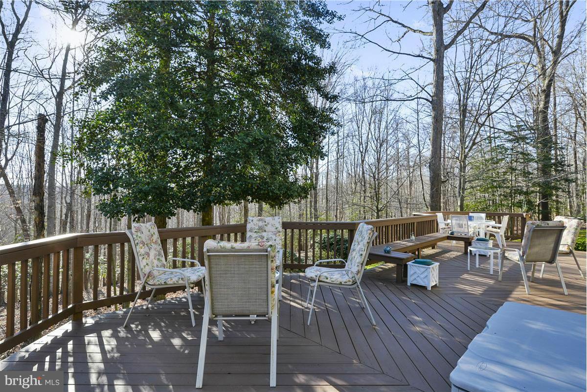 10839 Moore Drive Manassas, VA 20111 - Photo 13 of 30 a view of backyard with seating and green space