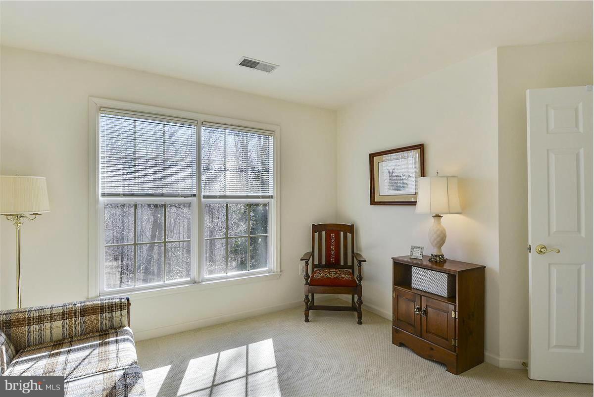 10839 Moore Drive Manassas, VA 20111 - Photo 21 of 30 a living room with furniture and a window