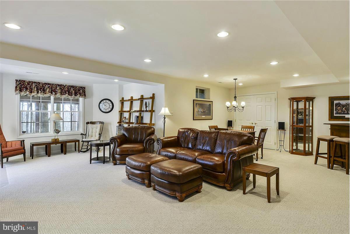 10839 Moore Drive Manassas, VA 20111 - Photo 23 of 30 a living room with furniture and a large window