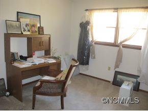 158 Howell Cove Road Canton, NC 28716 - Photo 11 of 14 a room with a window