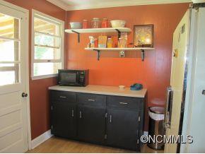 158 Howell Cove Road Canton, NC 28716 - Photo 5 of 14 a bathroom with a sink and a toilet