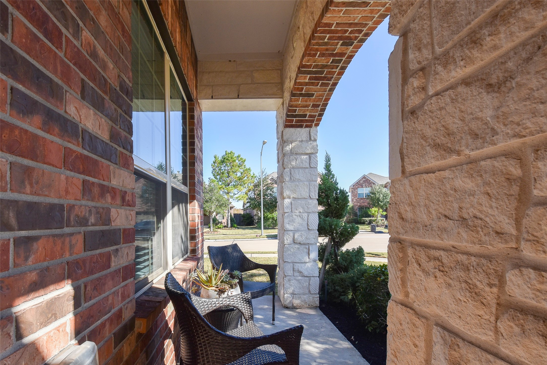 6427 Addlestone Ridge Lane Katy, TX 77494 - Photo 3 of 32 Beautiful porch area. Security system with Vivint included with rent.