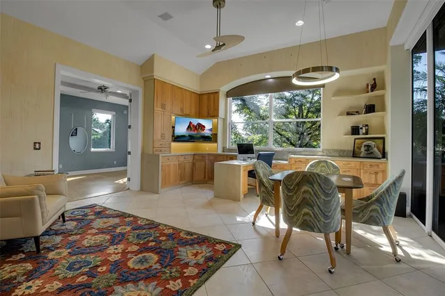 a view of an outside dining space with furniture