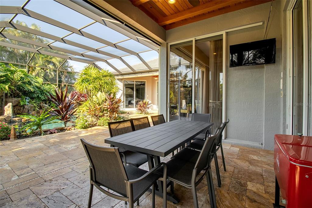 8116 Lone Tree Glen Lakewood Ranch, FL 34202 - Photo 42 of 48 a view of an outside dining space with furniture