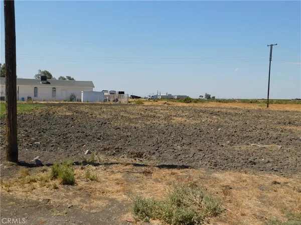a view of a beach with a house