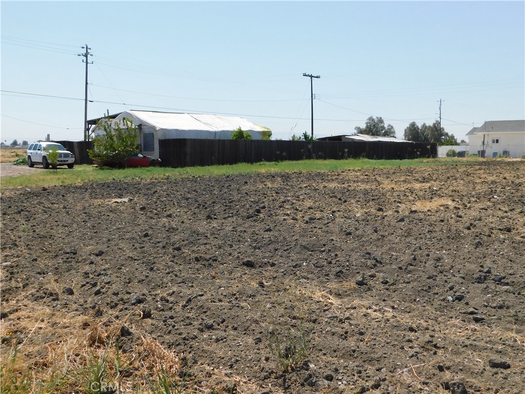 0 West Almond Street Dos Palos, CA 93620 - Photo 3 of 7 a view of a house with a yard