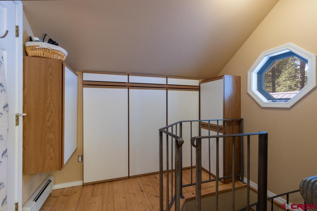 171 Deer Trail Road Durango, CO 81303 - Photo 26 of 35 a view of an entryway with wooden floor