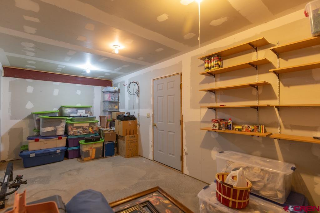 171 Deer Trail Road Durango, CO 81303 - Photo 32 of 35 a view of a livingroom with furniture and storage